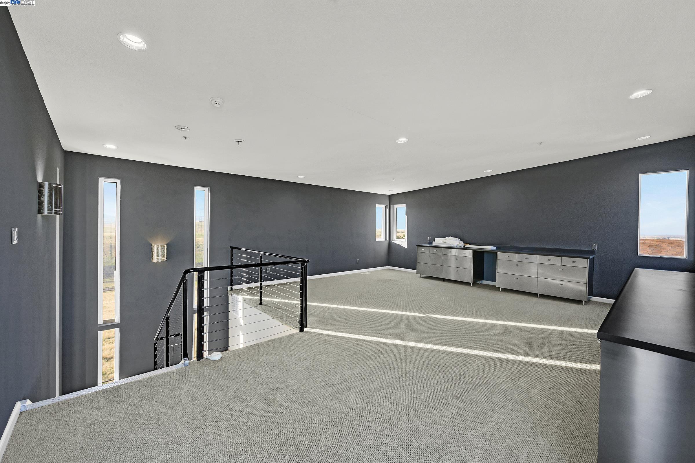 17011 North Midway Road Tracy, CA 95377 - Photo 44 of 52 a view of a hallway with a chandelier