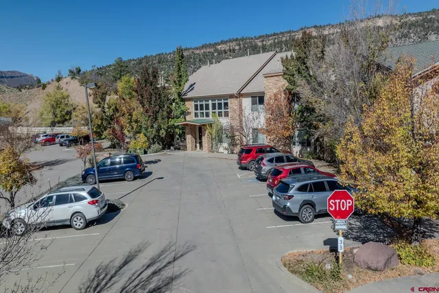 a car parked in front of a house