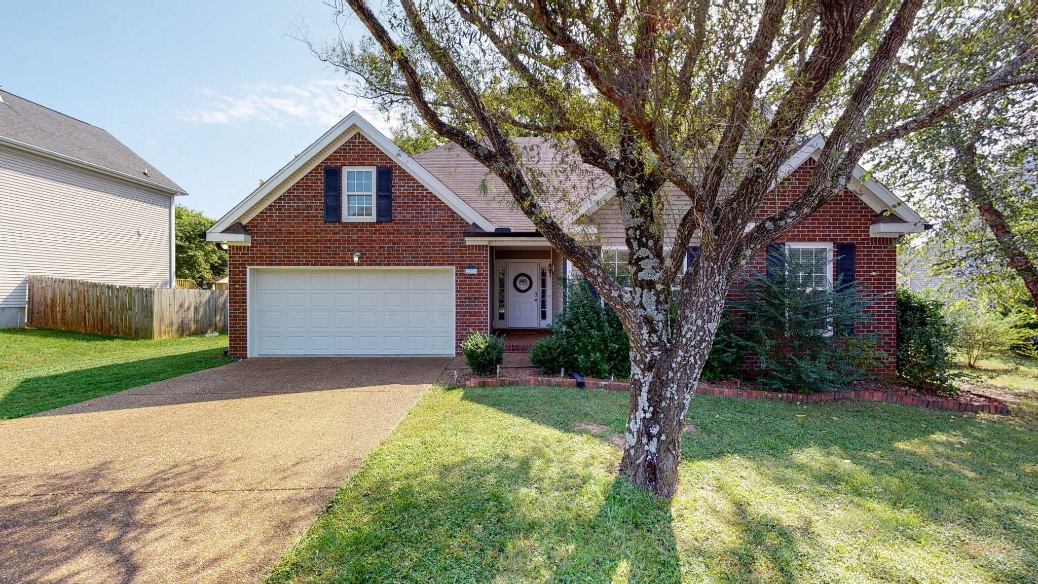 2804 Rippavilla Way Spring Hill, TN 37174 - Photo 1 of 18 a front view of a house with garden