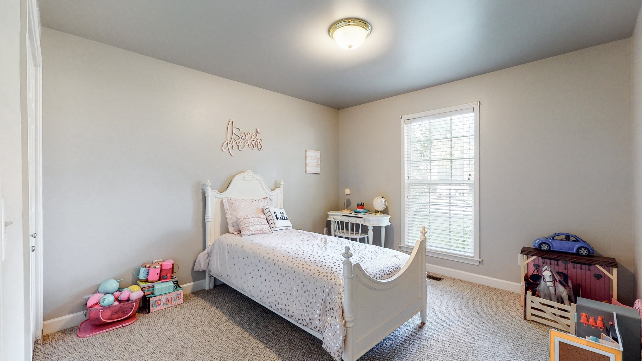2804 Rippavilla Way Spring Hill, TN 37174 - Photo 12 of 18 a bedroom with a bed and a window