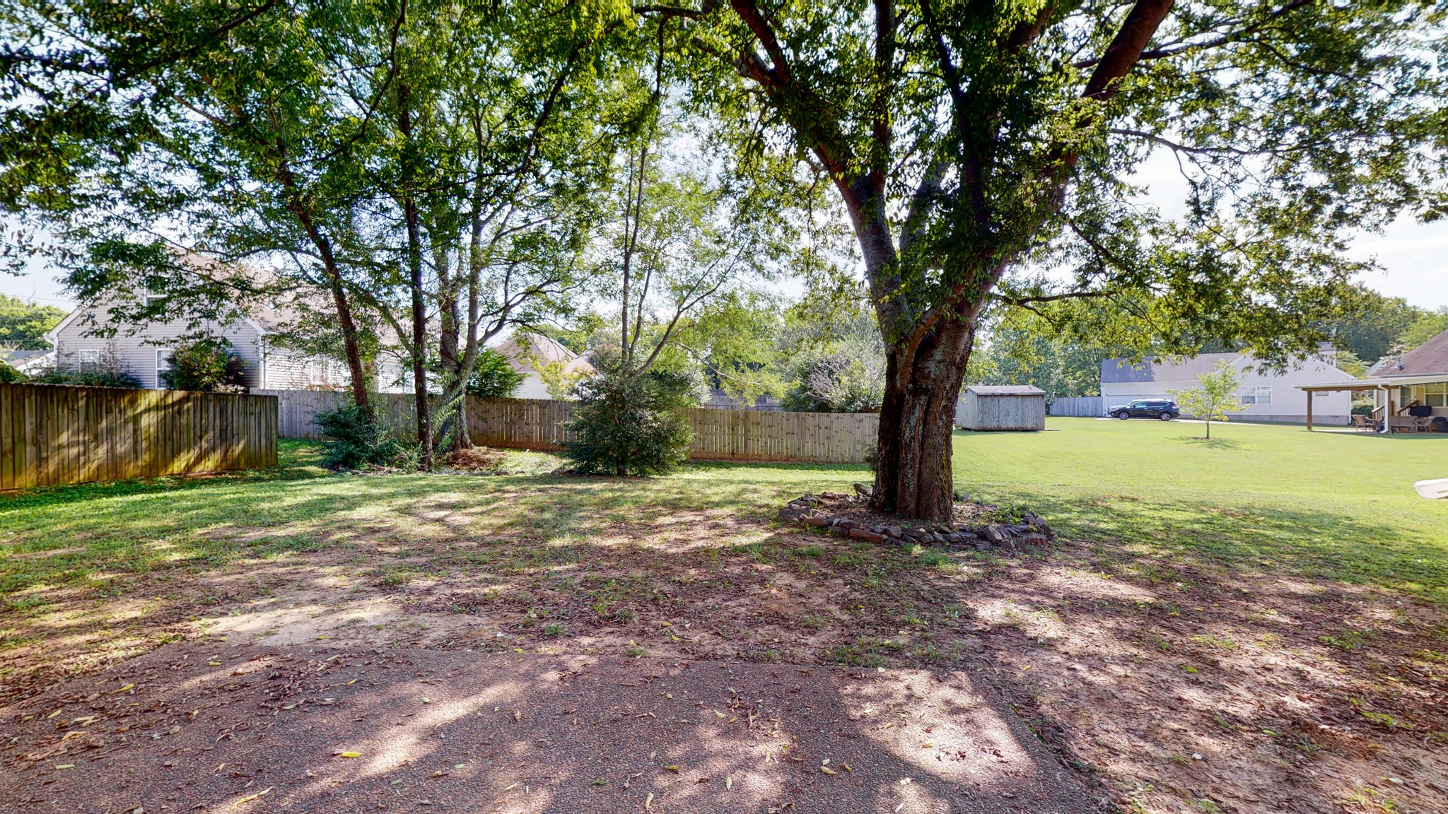 2804 Rippavilla Way Spring Hill, TN 37174 - Photo 15 of 18 a backyard of a house with lots of green space