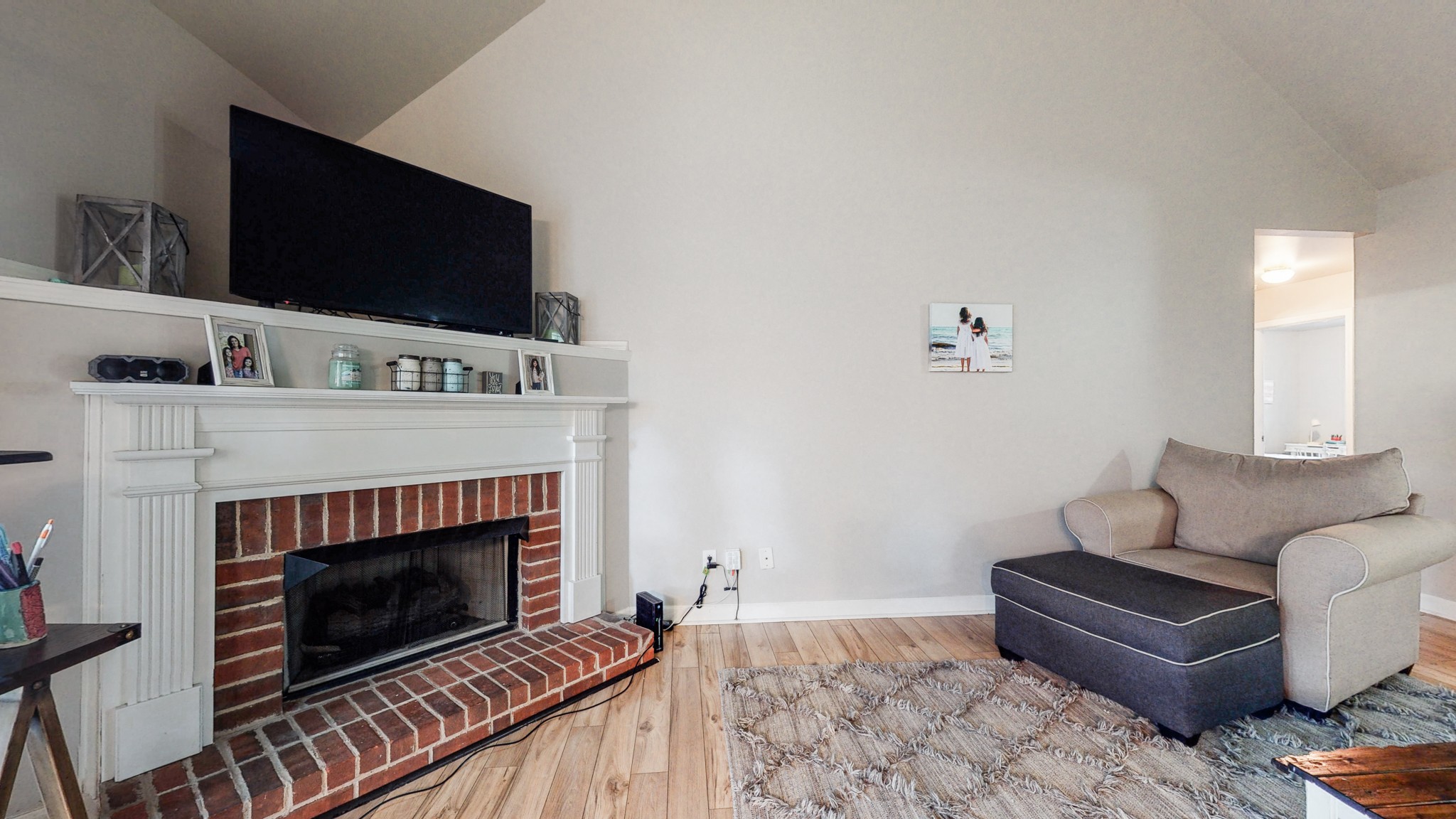 2804 Rippavilla Way Spring Hill, TN 37174 - Photo 4 of 18 a living room with furniture and a fireplace
