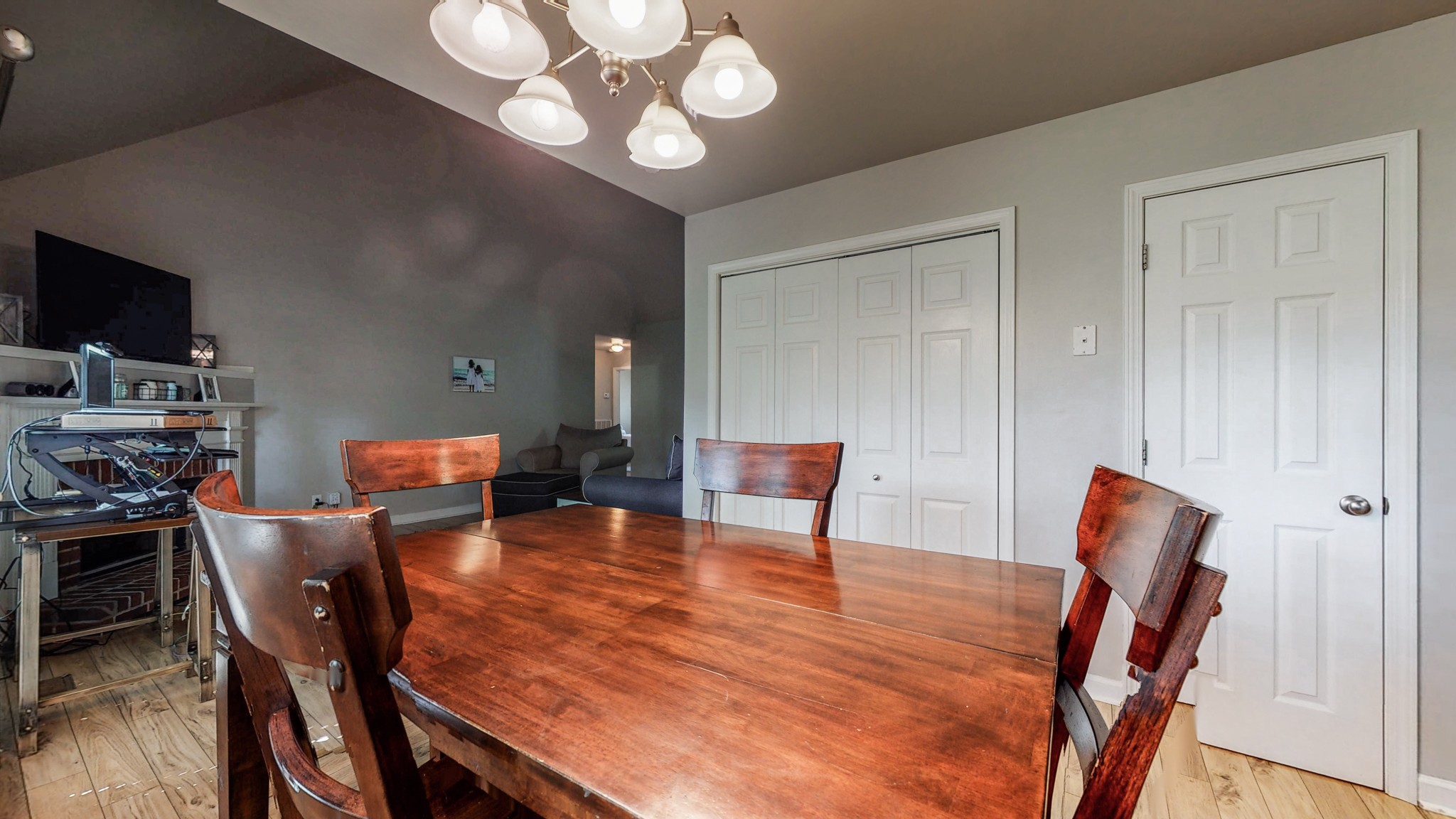 2804 Rippavilla Way Spring Hill, TN 37174 - Photo 6 of 18 a view of a dining room with furniture and a flat screen tv