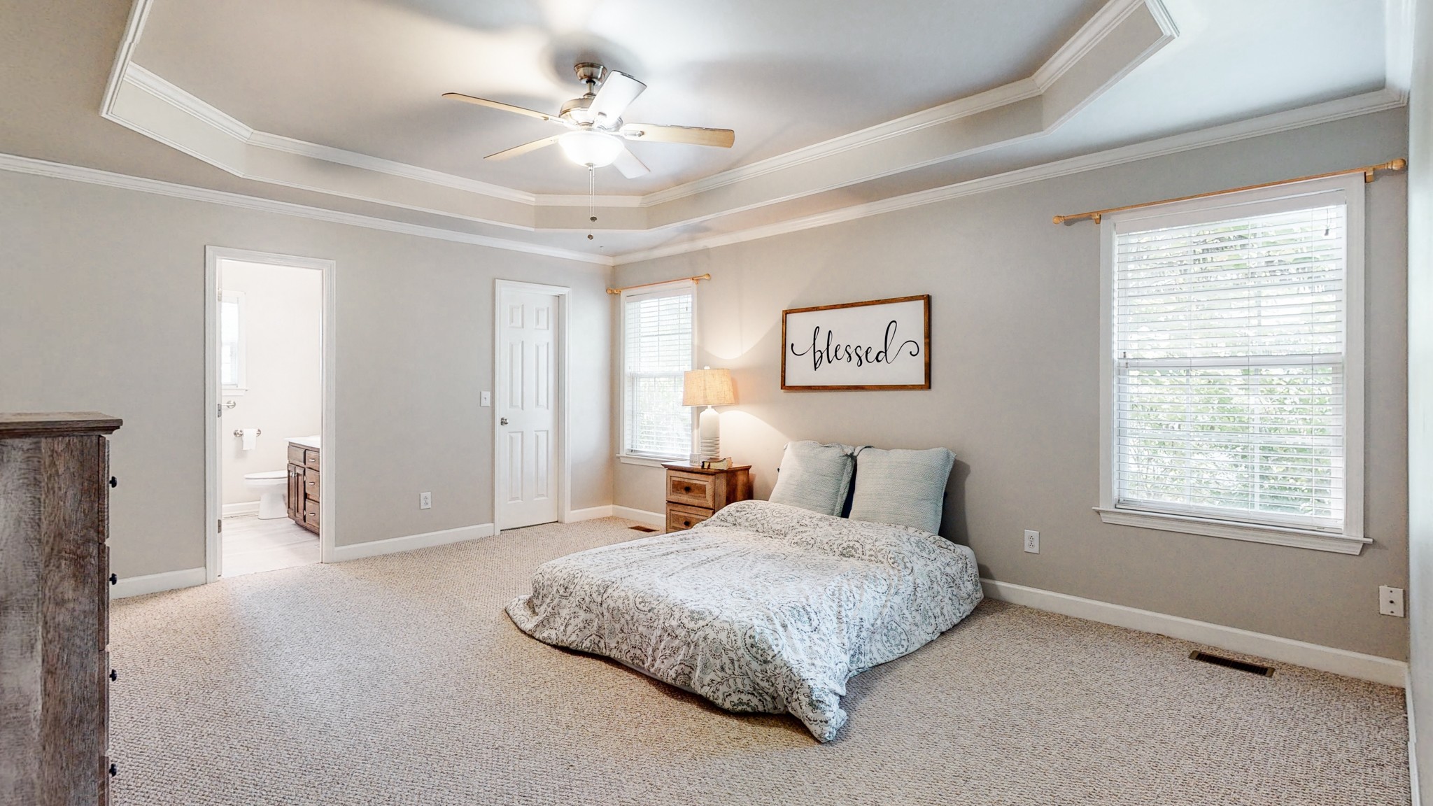 2804 Rippavilla Way Spring Hill, TN 37174 - Photo 7 of 18 a spacious bedroom with a bed and a chandelier