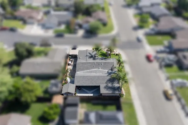 a view of house with a yard