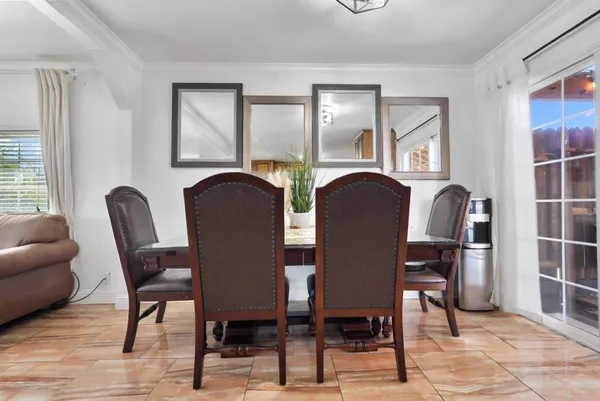 a view of a livingroom with furniture and windows
