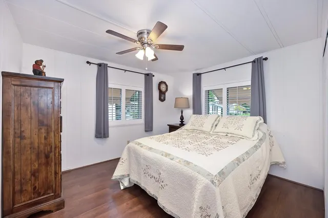 a view of outdoor space with wooden floor and furniture