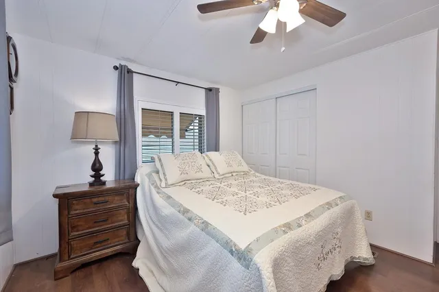 a view of a chairs and table in the balcony