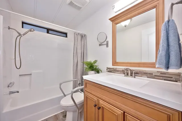 a view of a patio with furniture