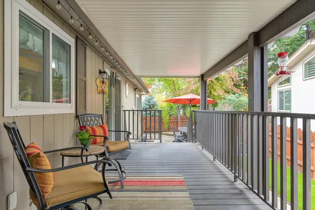 a view of backyard with cabin