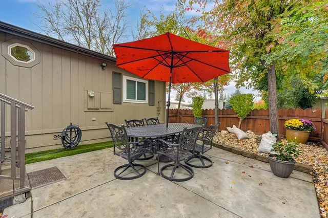 a view of balcony with wooden floor