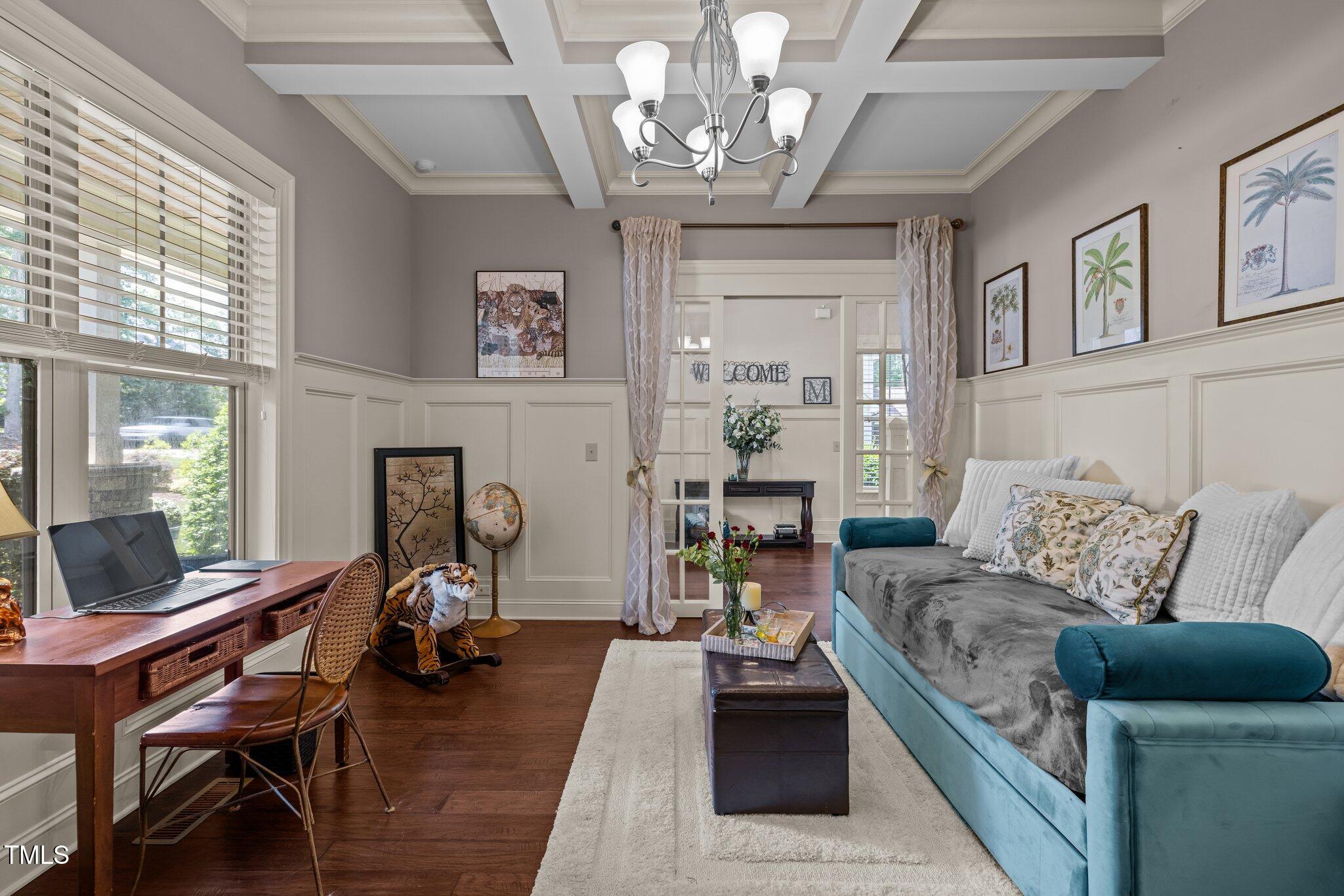 12216 Kyle Abbey Lane Raleigh, NC 27613 - Photo 11 of 60 a living room with furniture and a fireplace