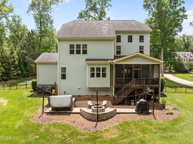 a view of a swimming pool with a lounge chair
