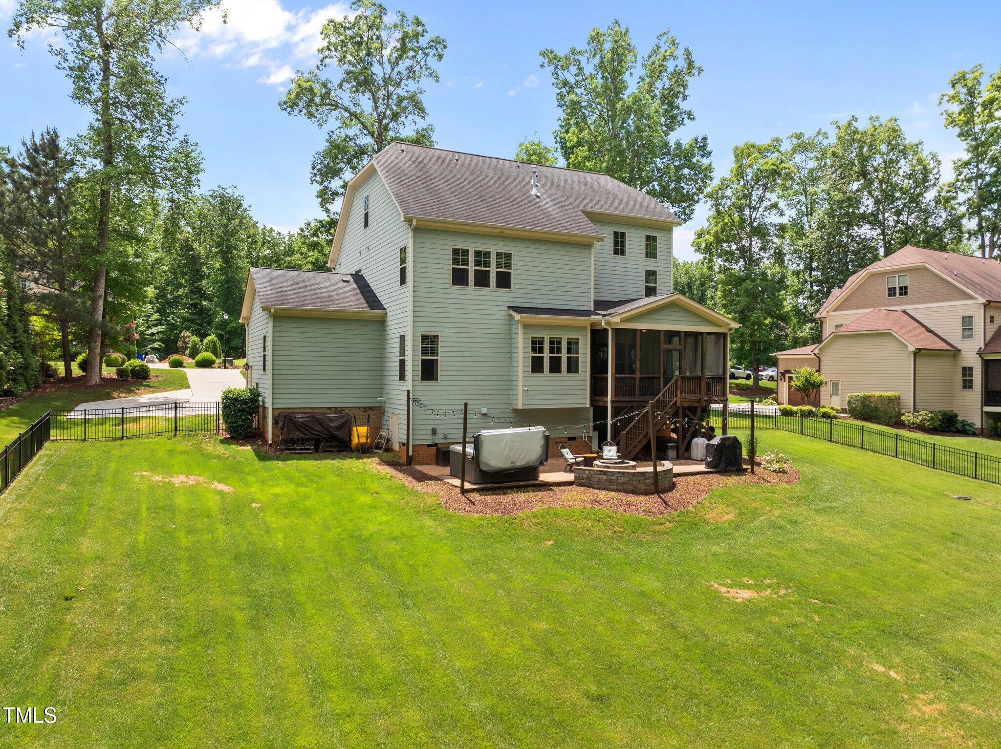 12216 Kyle Abbey Lane Raleigh, NC 27613 - Photo 42 of 60 a view of a house with swimming pool and sitting area