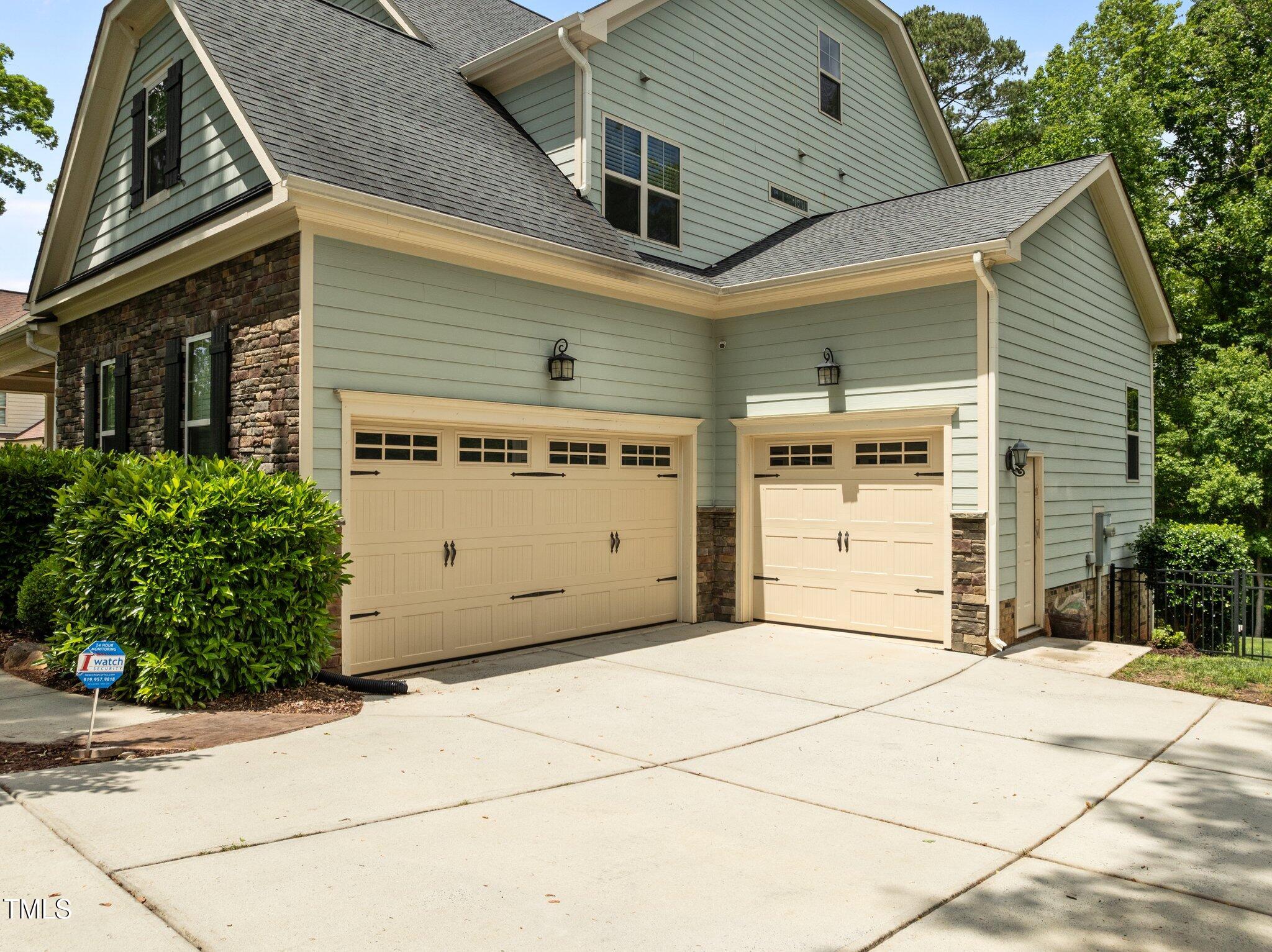 12216 Kyle Abbey Lane Raleigh, NC 27613 - Photo 47 of 60 a view of a garage