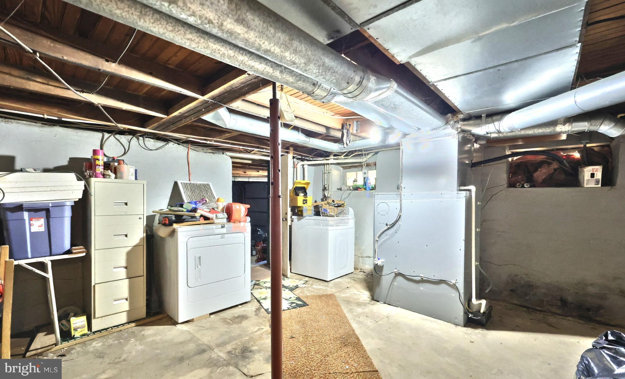 50 Bahns Mill Road Red Lion, PA 17356 - Photo 13 of 19 Spacious basement with laundry facilities.