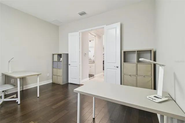 a kitchen with furniture and a table