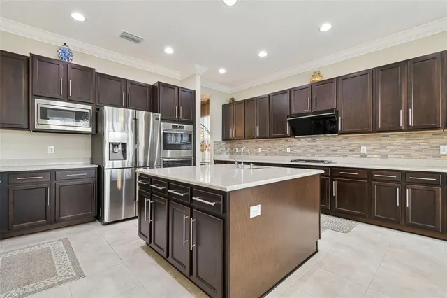 a large white bed in a white room