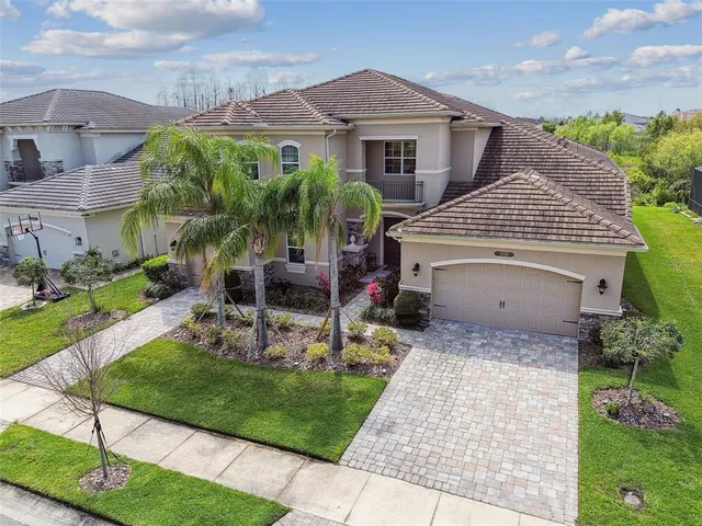 a utility room with sink dryer and washer