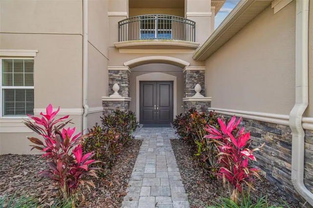 a kitchen with kitchen island white cabinets and a sink