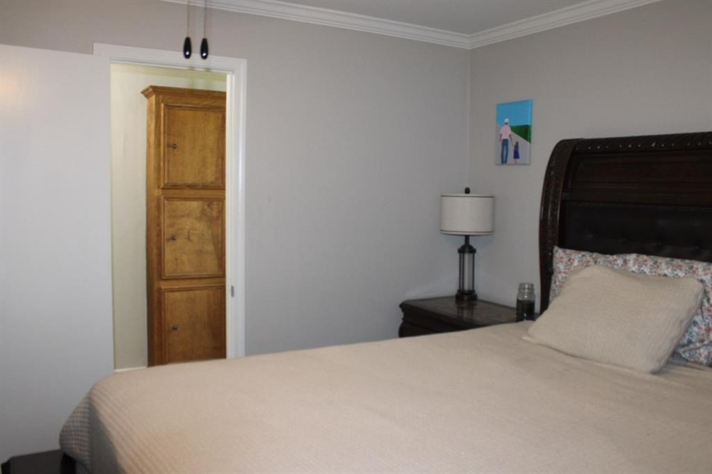 2693 Rhoda Road Shreveport, LA 71119 - Photo 15 of 35 a bedroom with a bed and a window