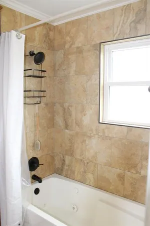 a bathroom with a bathtub