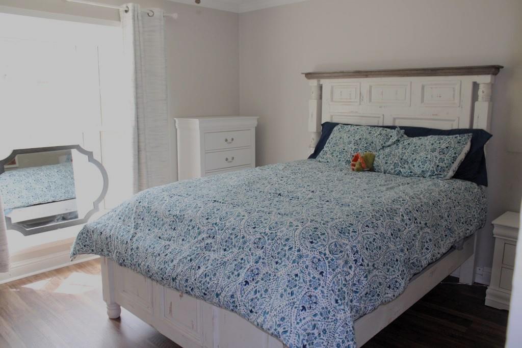 2693 Rhoda Road Shreveport, LA 71119 - Photo 19 of 39 a bedroom with a bed and dresser
