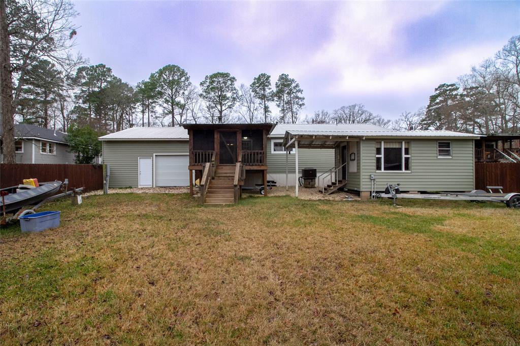 2693 Rhoda Road Shreveport, LA 71119 - Photo 30 of 39 a view of a house with backyard and porch