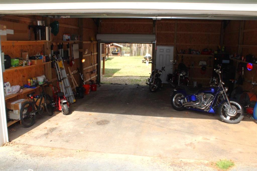 2693 Rhoda Road Shreveport, LA 71119 - Photo 32 of 35 a view of a garage with rack and bicycle