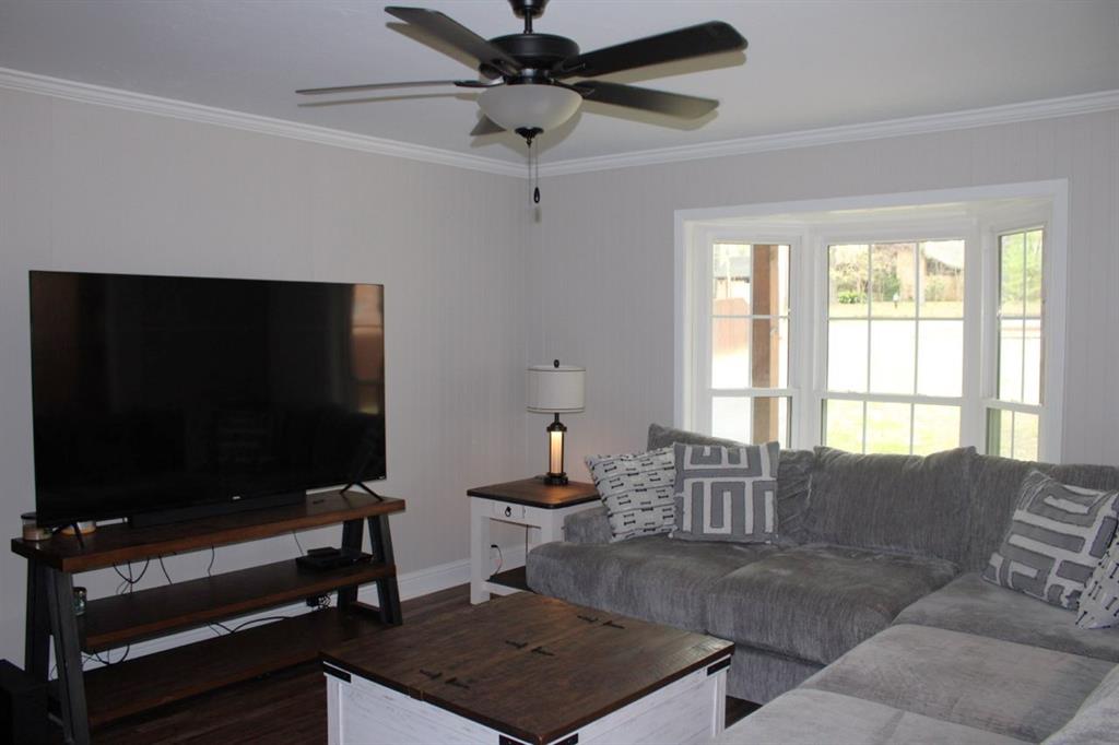 2693 Rhoda Road Shreveport, LA 71119 - Photo 7 of 39 a living room with furniture and a flat screen tv