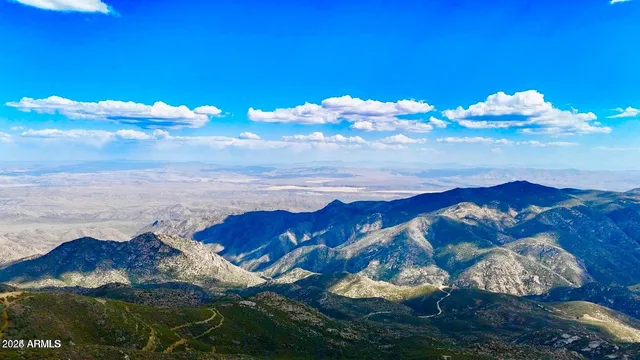 a view of mountains and valleys