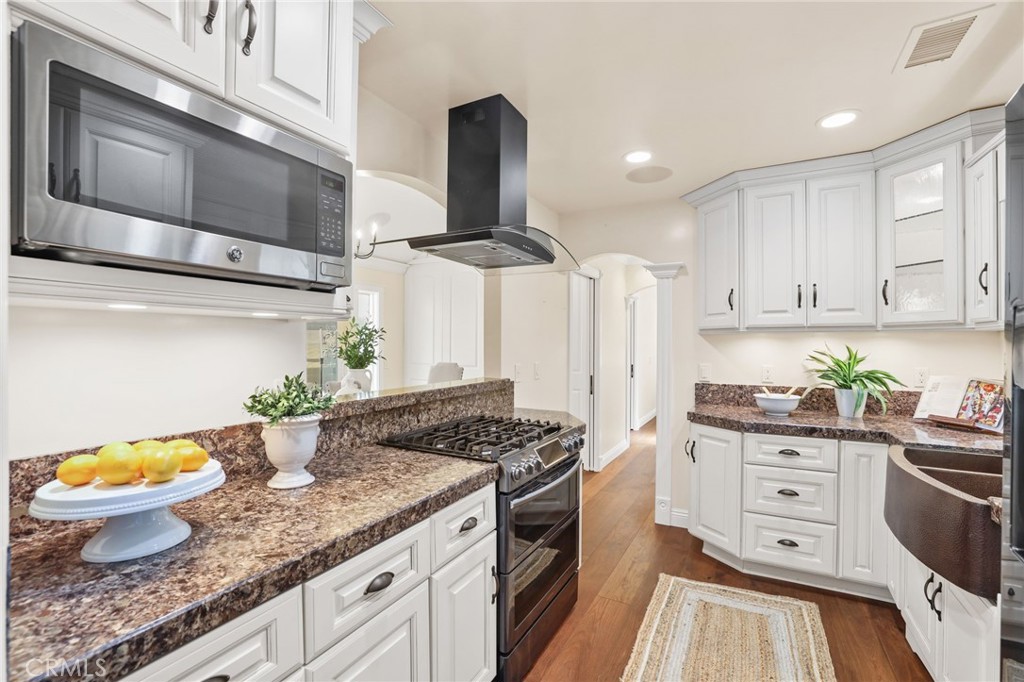 222 8th Street Seal Beach, CA 90740 - Photo 11 of 41 Remodeled kitchen with copper sink.