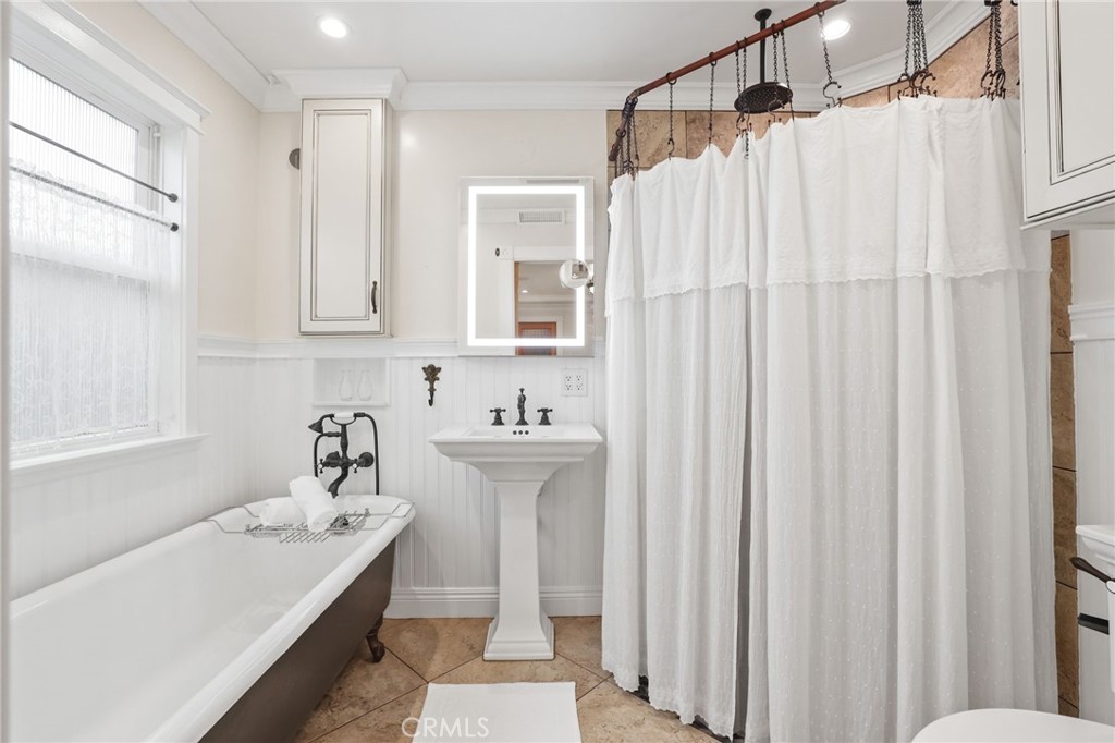 222 8th Street Seal Beach, CA 90740 - Photo 19 of 41 On-suite bathroom with separate tub and shower and heated floors.