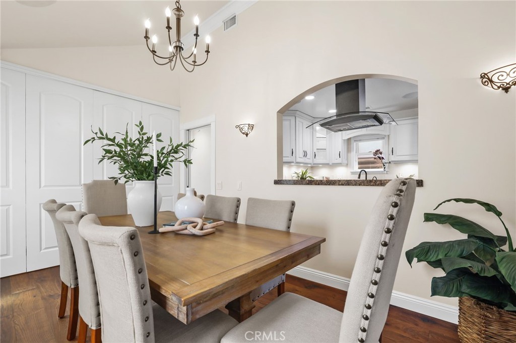 222 8th Street Seal Beach, CA 90740 - Photo 10 of 41 formal dining room with access to the kitchen.