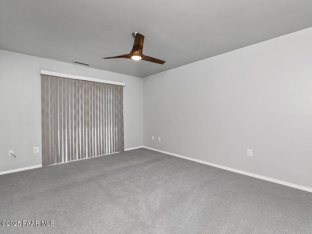 1034 Bunker Place Dewey, AZ 86327 - Photo 11 of 17 a view of an empty room with a window