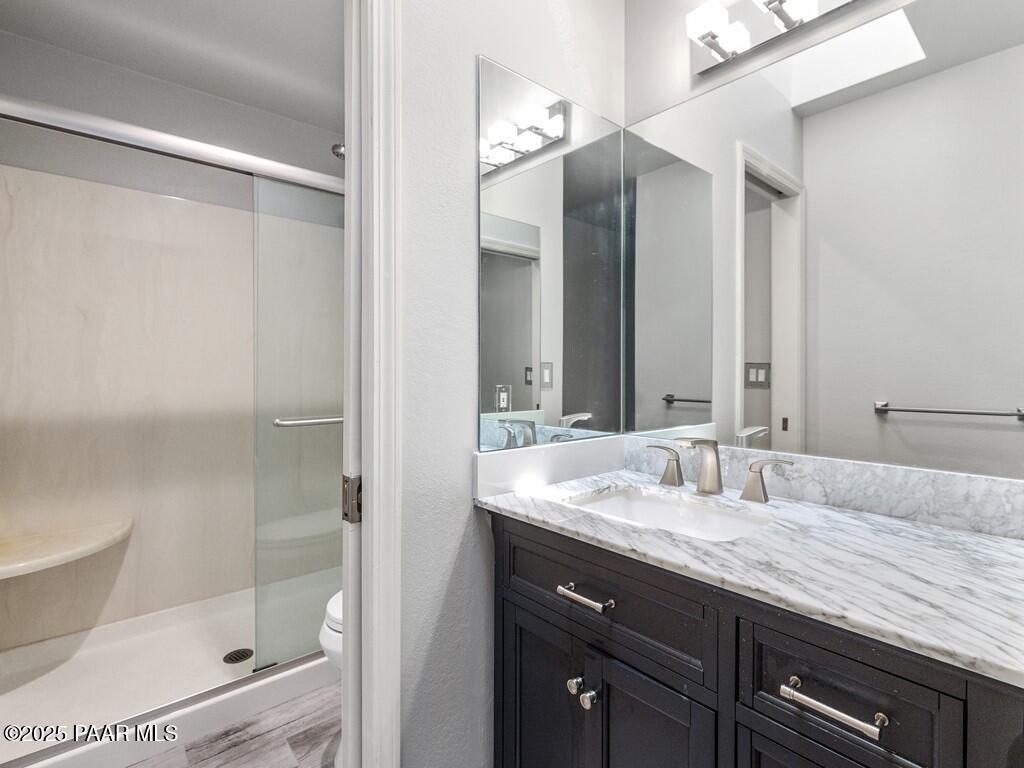1034 Bunker Place Dewey, AZ 86327 - Photo 12 of 17 a bathroom with a sink and a mirror