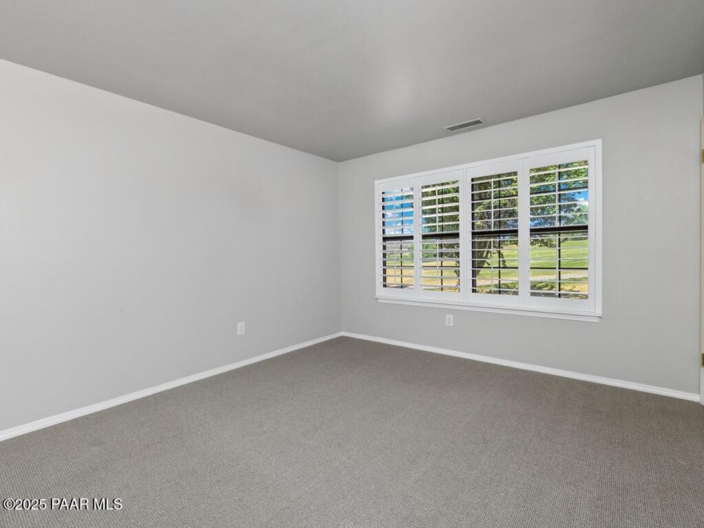 1034 Bunker Place Dewey, AZ 86327 - Photo 13 of 17 an empty room with windows