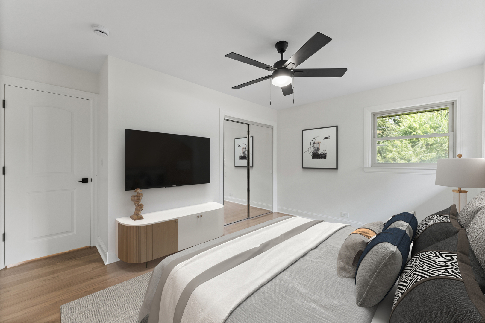 208 47th Street Western Springs, IL 60558 - Photo 21 of 53 a bedroom with a bed and a flat screen tv