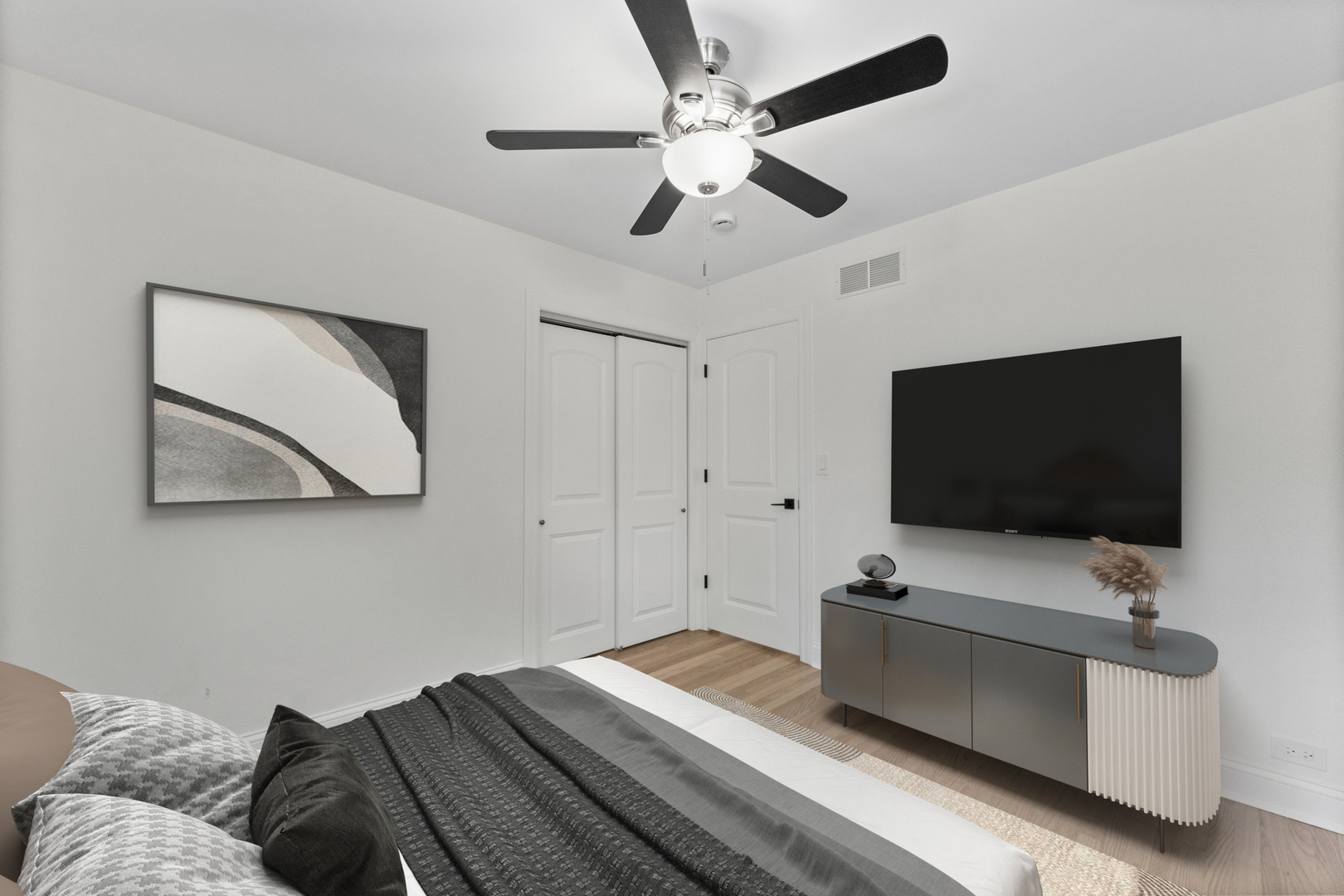 208 47th Street Western Springs, IL 60558 - Photo 25 of 53 a bedroom with a bed and a flat screen tv