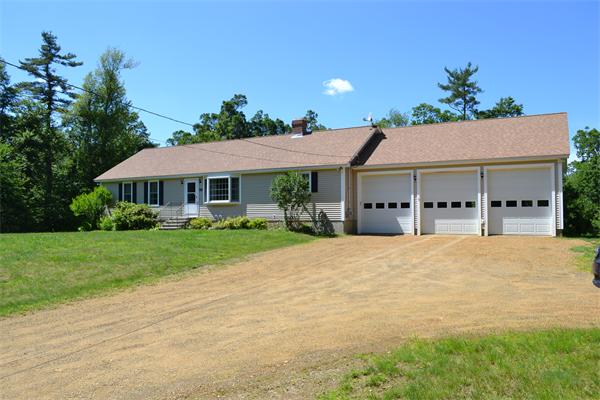 75 Irish Lane Rutland, MA 01543 - Photo 1 of 30 a front view of a house with a garden