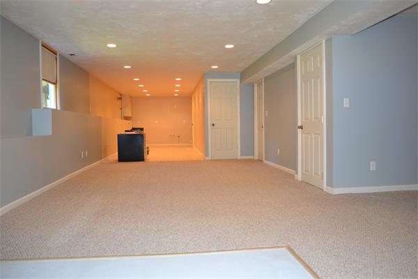 75 Irish Lane Rutland, MA 01543 - Photo 18 of 30 a view of a big room with windows