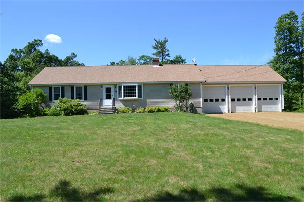 75 Irish Lane Rutland, MA 01543 - Photo 2 of 30 a view of a house with a yard and sitting area