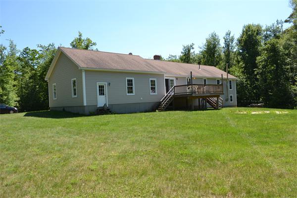 75 Irish Lane Rutland, MA 01543 - Photo 28 of 30 a front view of house with yard and green space