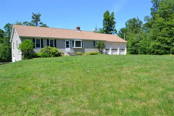 75 Irish Lane Rutland, MA 01543 - Photo 3 of 30 a front view of a house with a yard