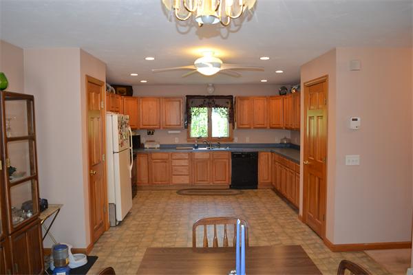 75 Irish Lane Rutland, MA 01543 - Photo 4 of 30 a kitchen with granite countertop stainless steel appliances cabinets a sink and a counter top space