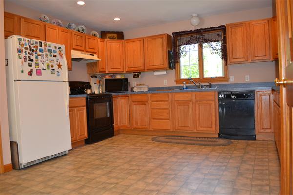 75 Irish Lane Rutland, MA 01543 - Photo 7 of 30 a kitchen with stainless steel appliances granite countertop a refrigerator and a sink