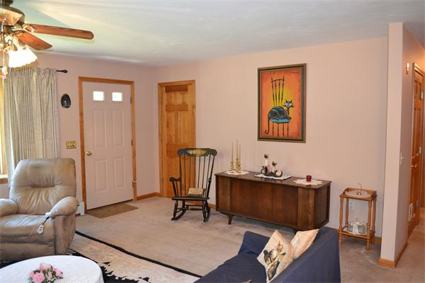 75 Irish Lane Rutland, MA 01543 - Photo 9 of 30 a living room with furniture rug and wooden floor