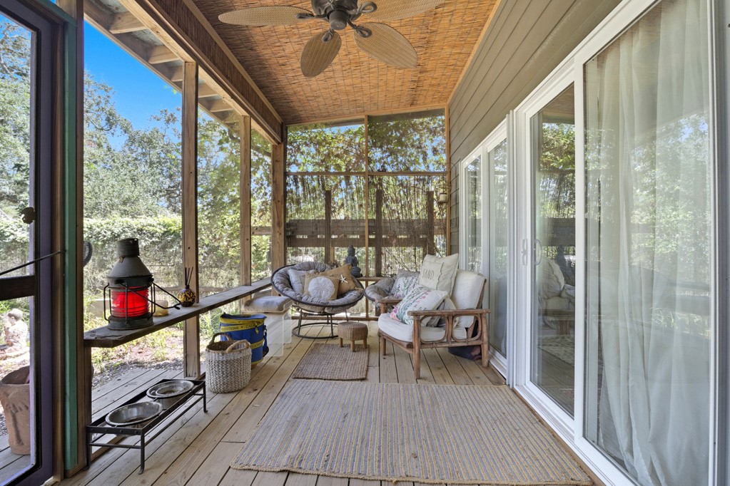 1908 Glass Avenue Rockport, TX 78382 - Photo 13 of 40 a very nice looking room with a large window and wooden floor