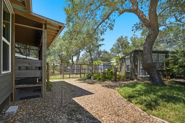 a view of a back yard of the house