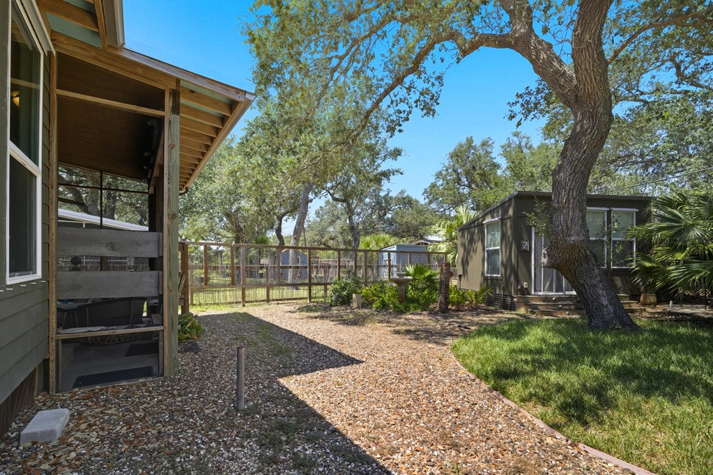 1908 Glass Avenue Rockport, TX 78382 - Photo 32 of 40 a view of a backyard with a tree